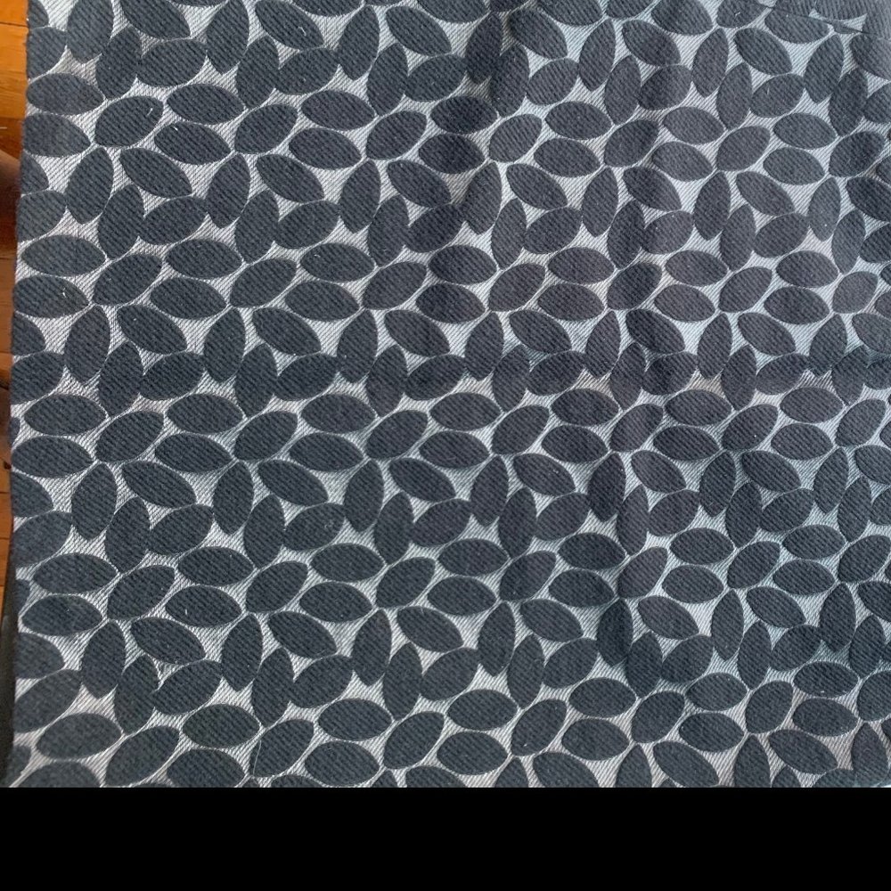 Knee length black on black skirt